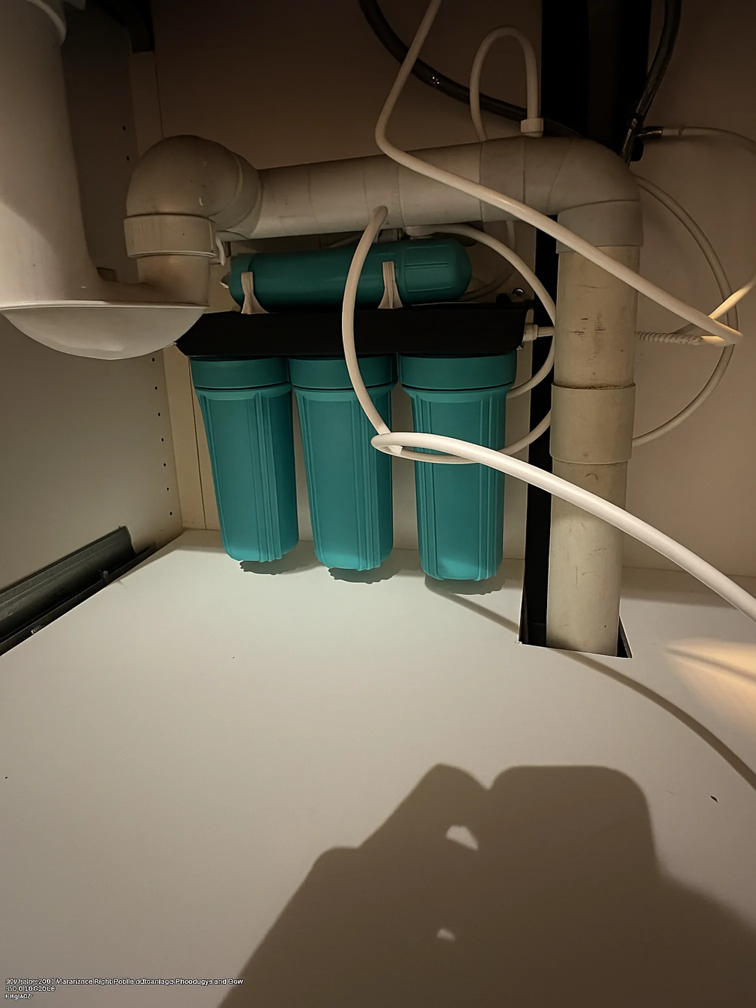 Under sink reverse osmosis water filter installed in Australian kitchen