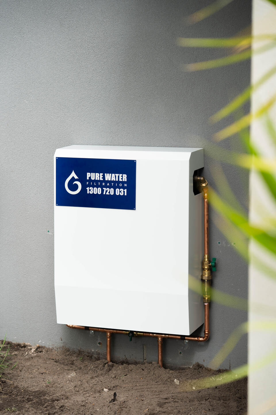 Multi-stage whole house water filtration system installed in Australian home utility area